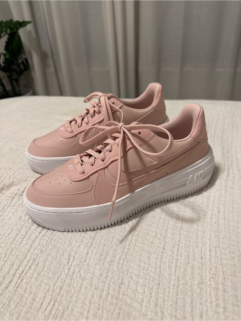 Nike Women's Rose Pink Platform Sneakers